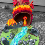 Large dinosaur caves with felt mat and rocks