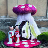 Hollow Toadstool homes with large peg people