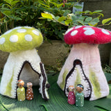 Hollow toadstool home with toadstool fairies
